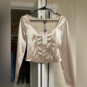 Cream satin corset top with long sleeves from express with tags still on